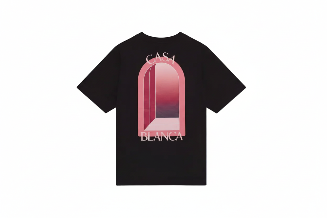 Black t-shirt with pink graphic design and 'Casa Blanca' text on a white background